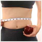 Woman with Measuring Tape and Apple