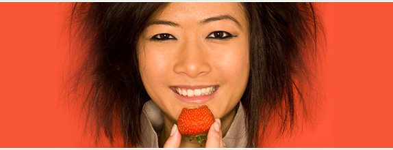 Woman Eating Strawberry