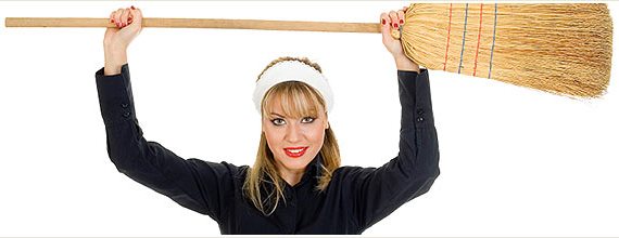 Woman Holding a Broom