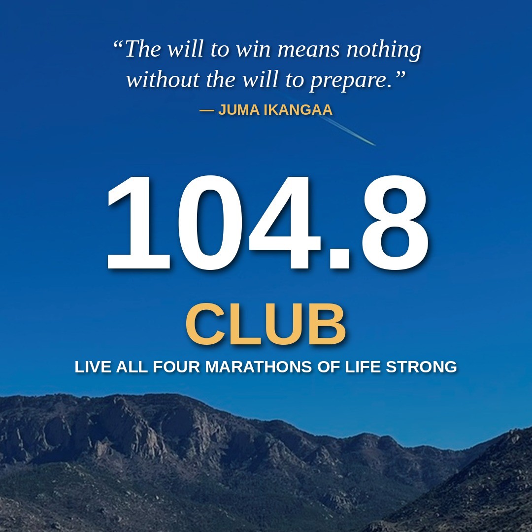 The 104.8 Club logo over the Sandia Mountains